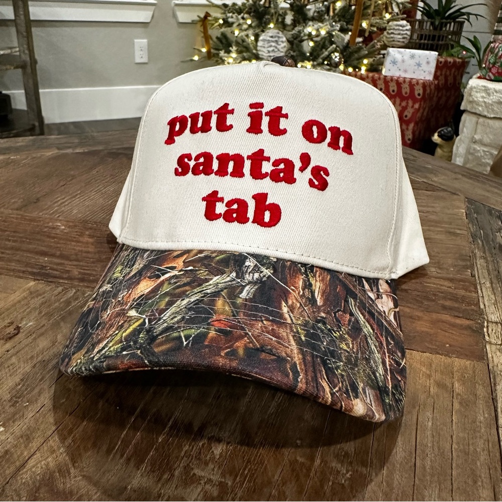 David and Young Off White Cap with Camouflage Brim “Put it on Santa’s tab”